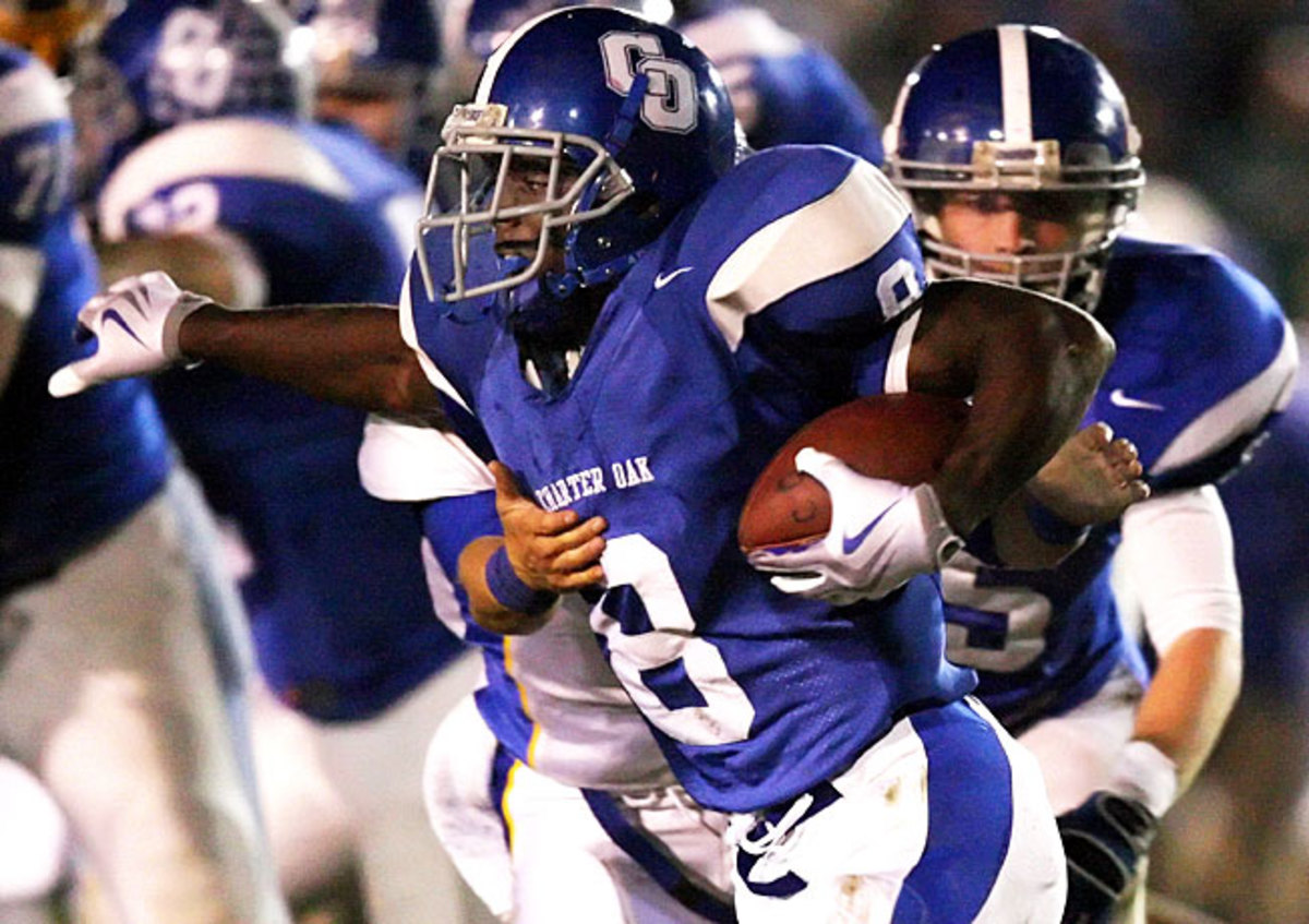 A star at Charter Oak High, Adam Muema (8) had a tendency to keep to himself, according to his coach.