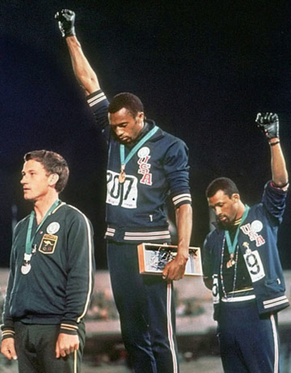 Today’s black athletes are still inspired by the gesture of Smith and Carlos in Mexico City in ’68. (AP)