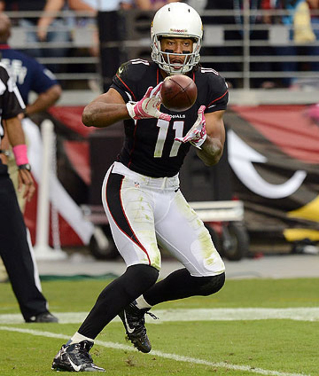 Larry Fitzgerald recently restructured his contract to give Arizona cap relief in 2014. (Norm Hall/Getty Images)