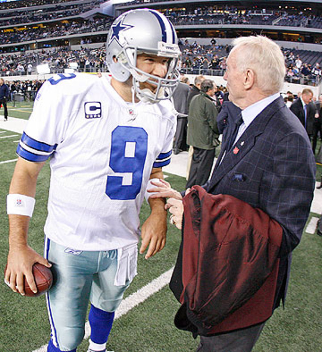 Jerry Jones and Tony Romo have only won one playoff game together. (James D Smith/AP)