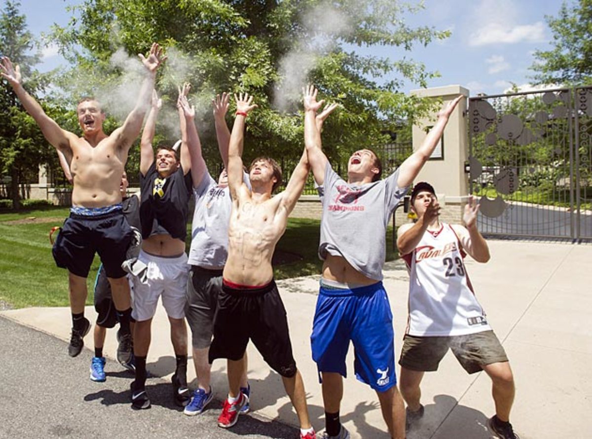 Fans celebrated LeBron James's return by imitating his pregame chalk routine in front of his Bath, Ohio, home.