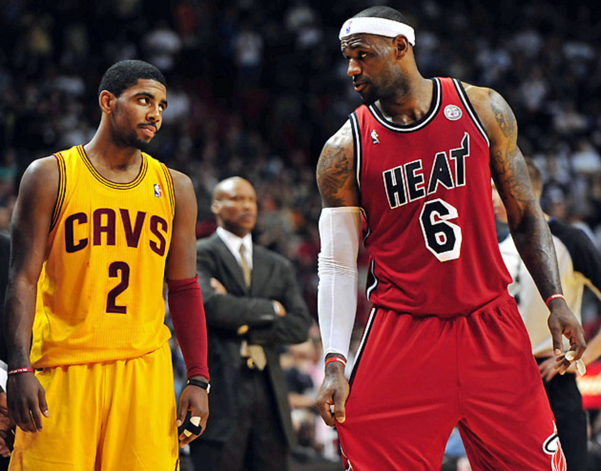 Former No. 1 pick Kyrie Irving (left) hasn't made the playoffs in his three seasons with the Cavs, but LeBron James will provide immediate help.