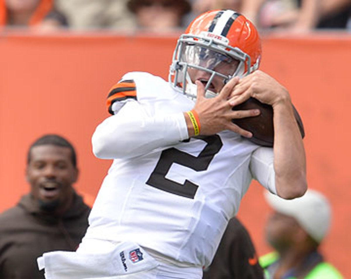 Johnny Manziel's trick play was called back for a penalty—and might have been illegal to start. (David Richard/AP)
