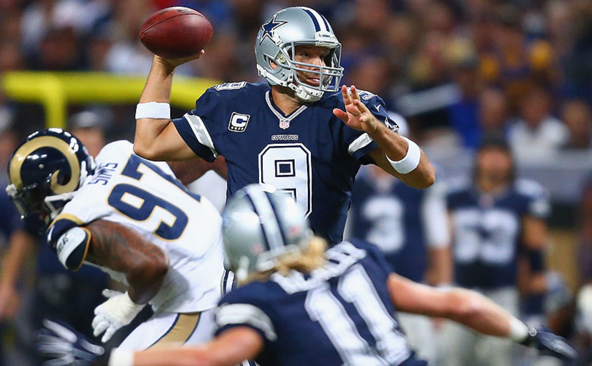 Tony Romo threw for 217 yards and two touchdowns in helping the Cowboys overcome a 21-0 deficit and beat the Rams on Sunday. (Dilip Vishwanat/Getty Images)