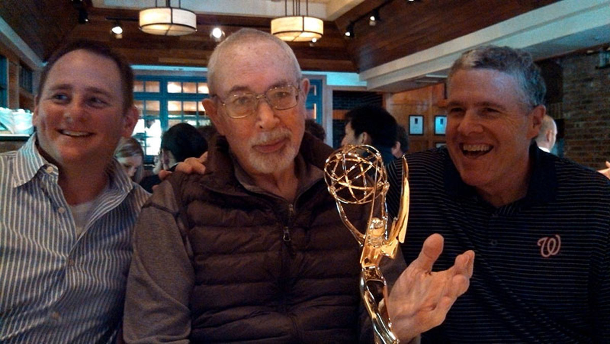 Ken Rodgers, left, and Peter King, right, flank Paul Zimmerman as Dr. Z shows off his Emmy. (Courtesy of Linda Zimmerman)