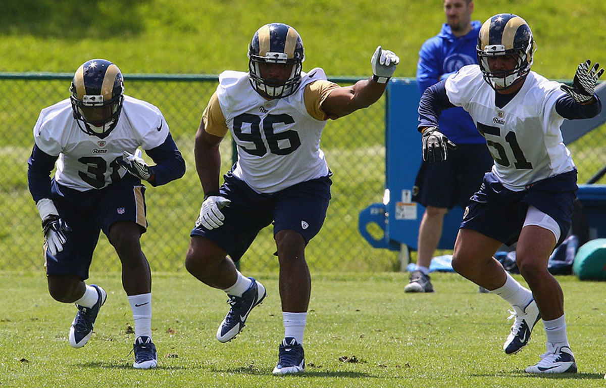 Michael Sam is wearing No. 96 as he competes for a roster spot on the Rams' defensive line. (Dilip Vishwanat/Getty Images)