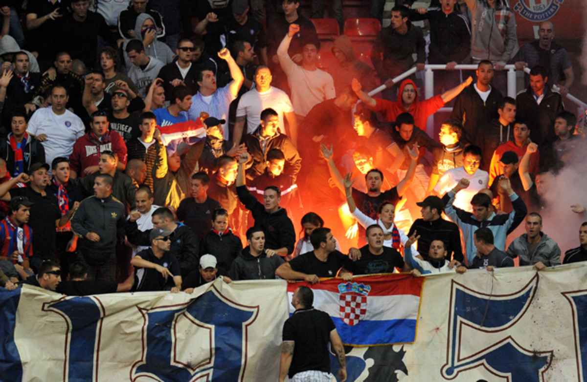 The raucous Bosnian-based Hajduk Split fans face a split of their own: Support Bosnia-Herzegovina or Croatia?