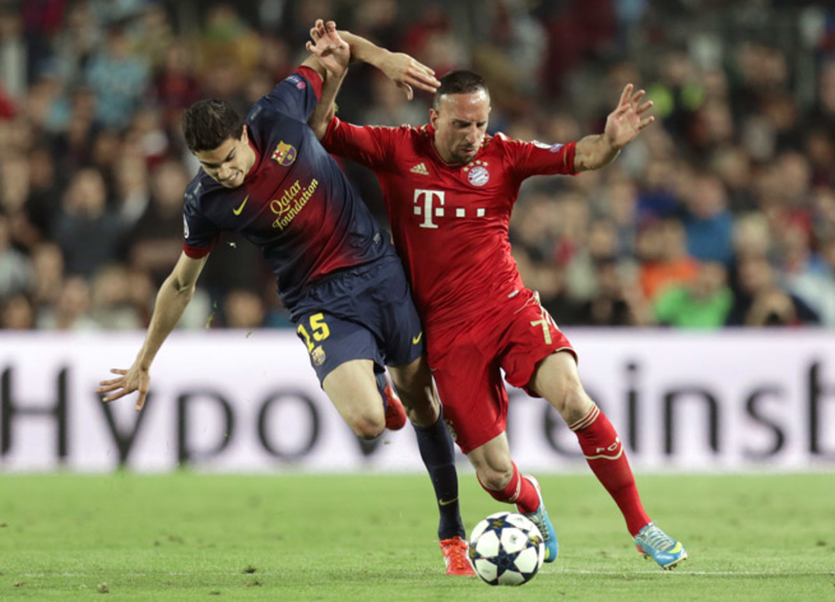 Barcelona defender Marc Bartra, left, signed a three-year extension to remain with the club through 2017.