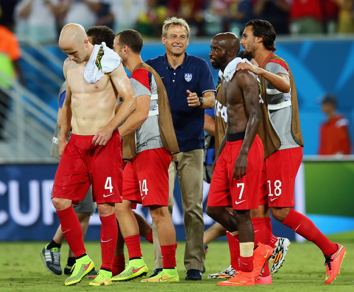 Jurgen Klinsmann of the United States smiles off to victory with his team after the 2014 FIFA World Cup Brazil Group G match between Ghana and the United States