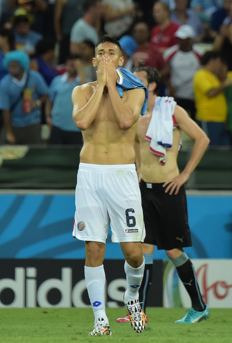 Costa Rica's defender Oscar Duarte celebrates after a Group D football match between Uruguay and Costa Rica