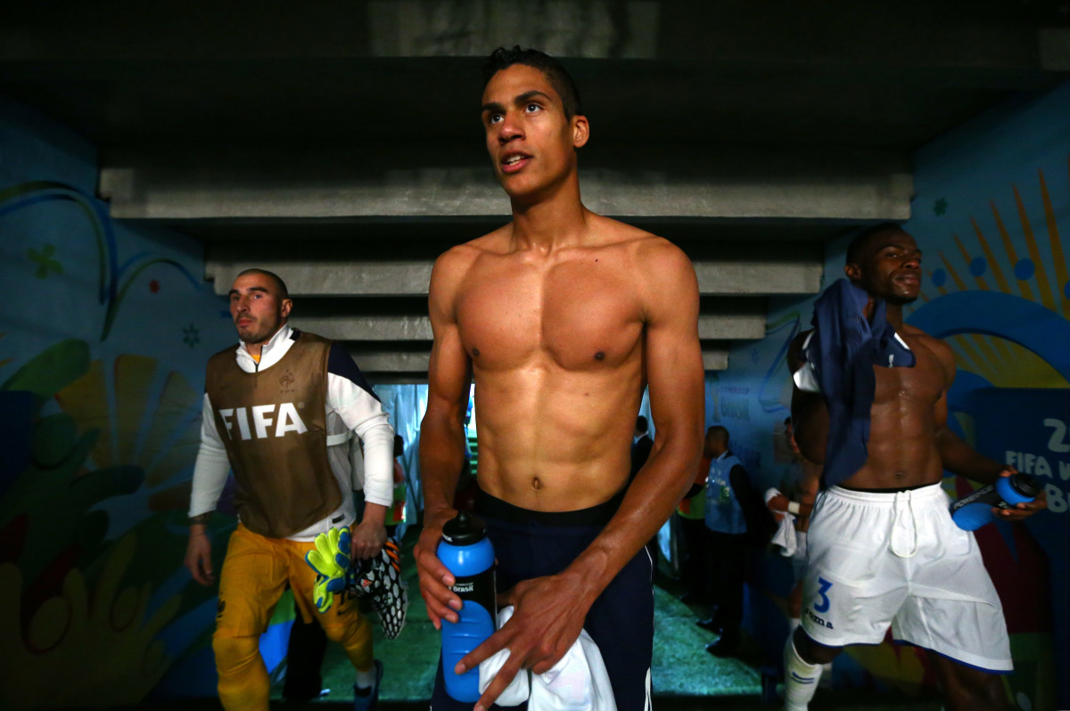 Raphael Varane of France enters the mixed zone after the 2014 FIFA World Cup Brazil Group E match between France and Honduras