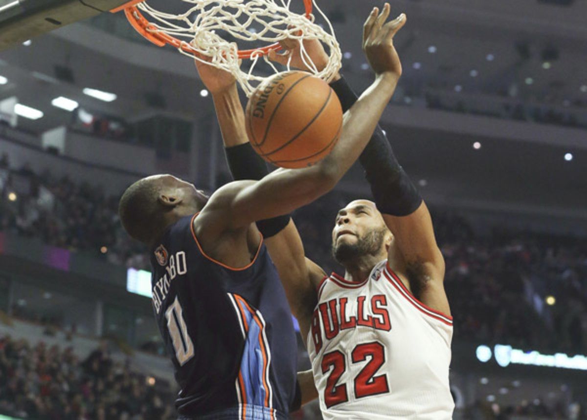 An underrated dunker, Taj Gibson threw down a thunderous slam on Bismack Biyombo. (Jonathan Daniel/Getty Images Sport)