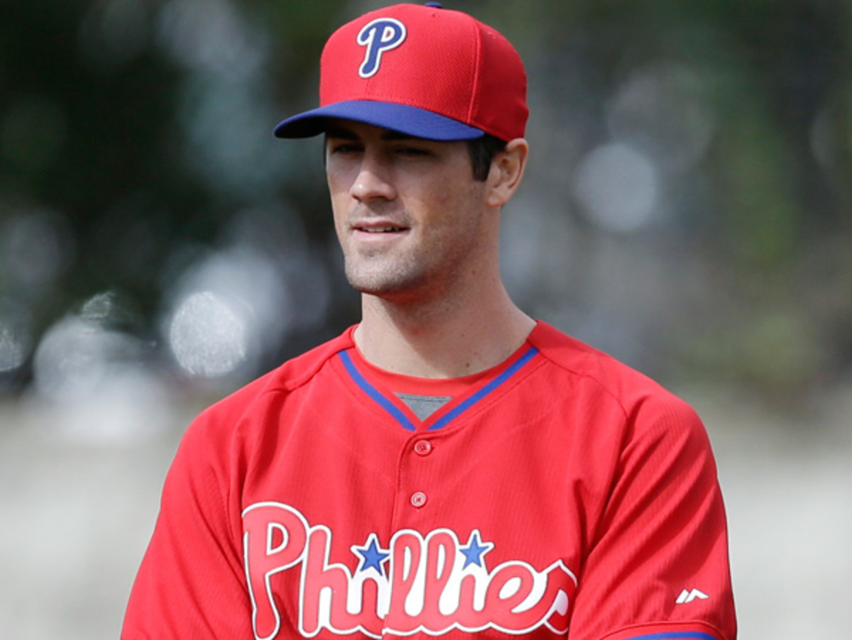 Cole Hamels will be sidelined likely through April with shoulder fatigue. (Charlie Neibergall/AP)