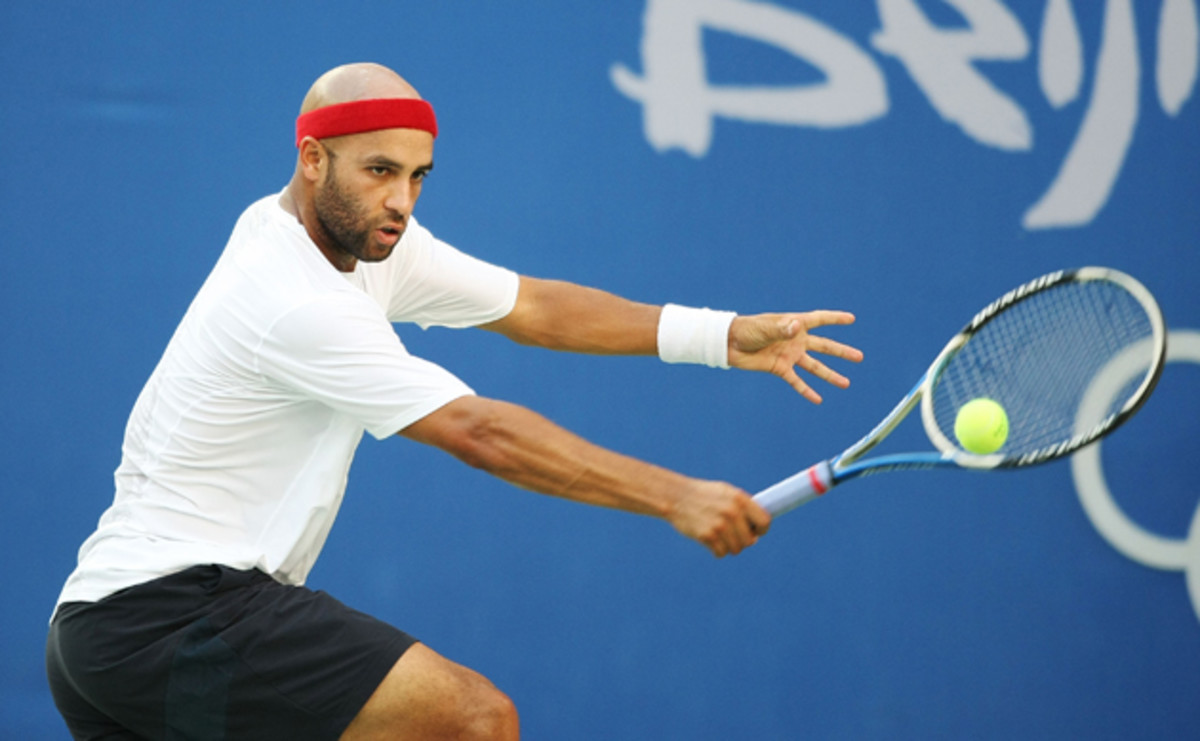 Blake hits a backhand at the Beijing 2008 Olympic Games.