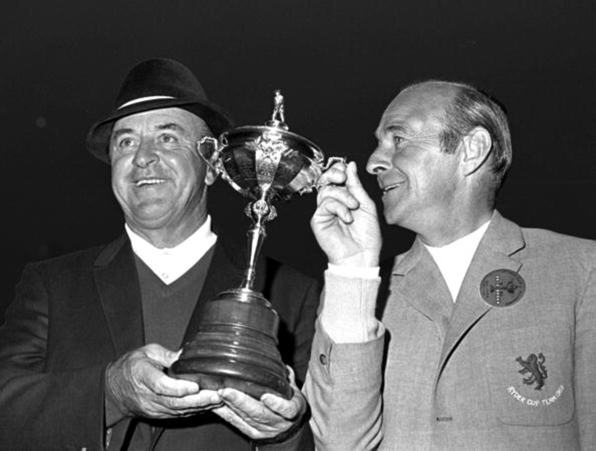 1969 Ryder Cup at Birkdale, US Captain Sam Snead pictured holding the trophy with Britain's Eric Brown after American and British teams tied.