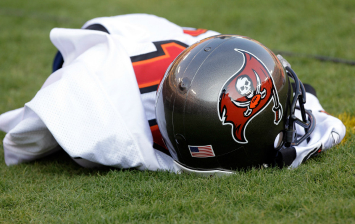 The Tampa Bay Buccaneers fired their GM and Head coach at the end of the 2013 season. (Rob Carr/Getty Images)