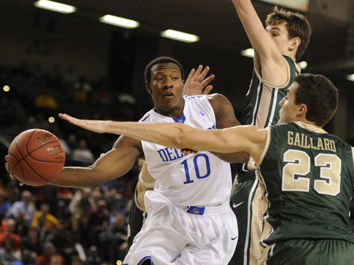 Devon Sadler (left) and Delaware eked out a close one to advance to the NCAA tournament. (Gail Burton/AP)