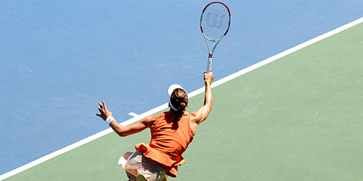 Andrea Petkovic returns a ball to Serena Williams on Day 6 of the Bank of the West Classic.