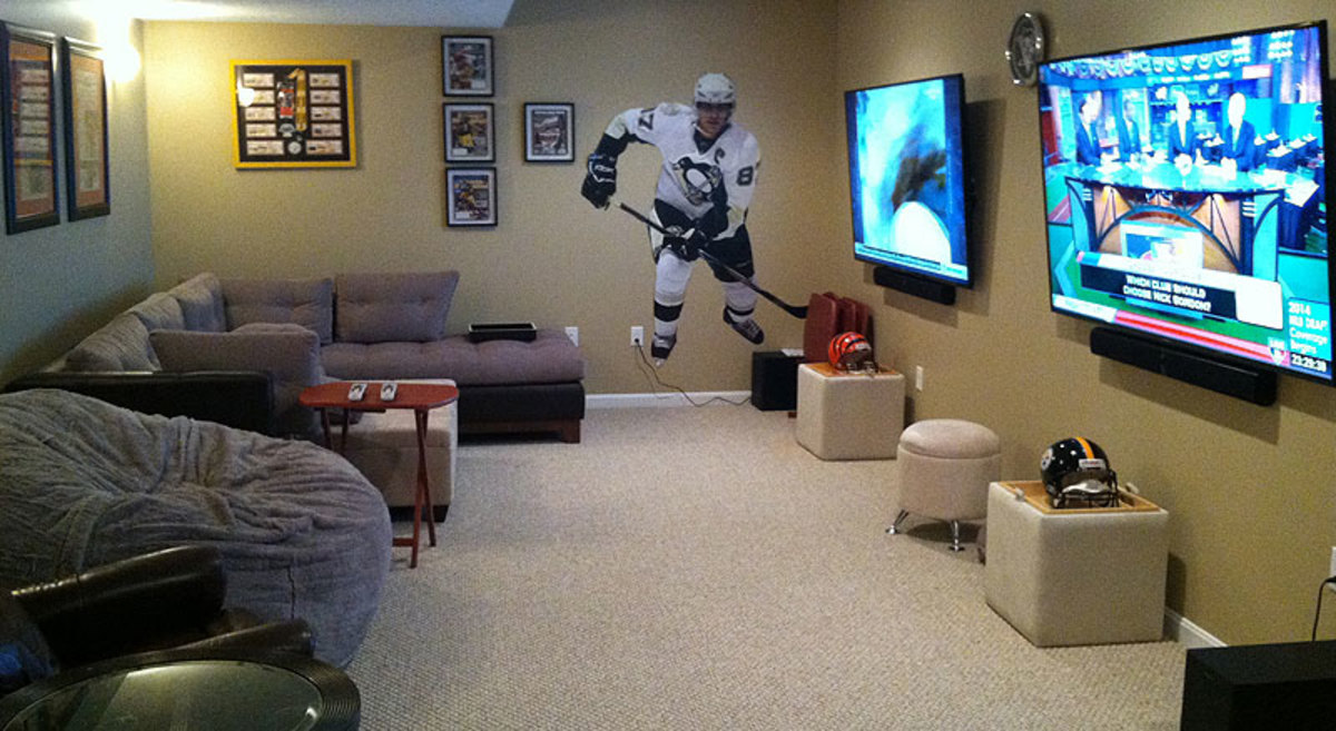 Michael and Erika Puck's Pennsylvania home features side-by-side 75-inch televisions—one for watching Erika's Steelers and one for Michael's Bengals. (Photo courtesy Puck family)