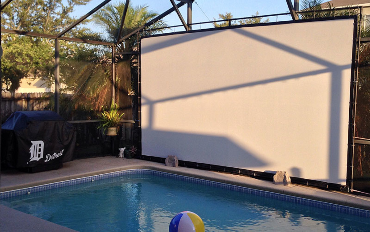 Gordy Brown's Florida home features a pool-side projector screen, typically tuned to NFL games on Sundays in the fall. (Photo courtesy Gordy Brown)