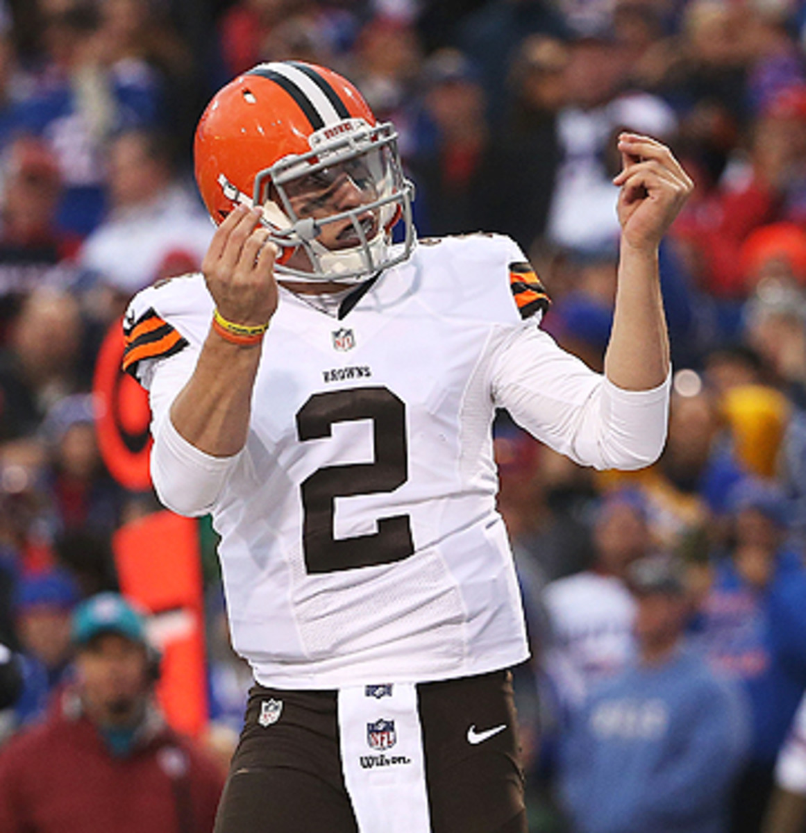 Entering the game in the fourth quarter, Manziel led an 80-yard TD drive. (Tom Szczerbowski/Getty Images)