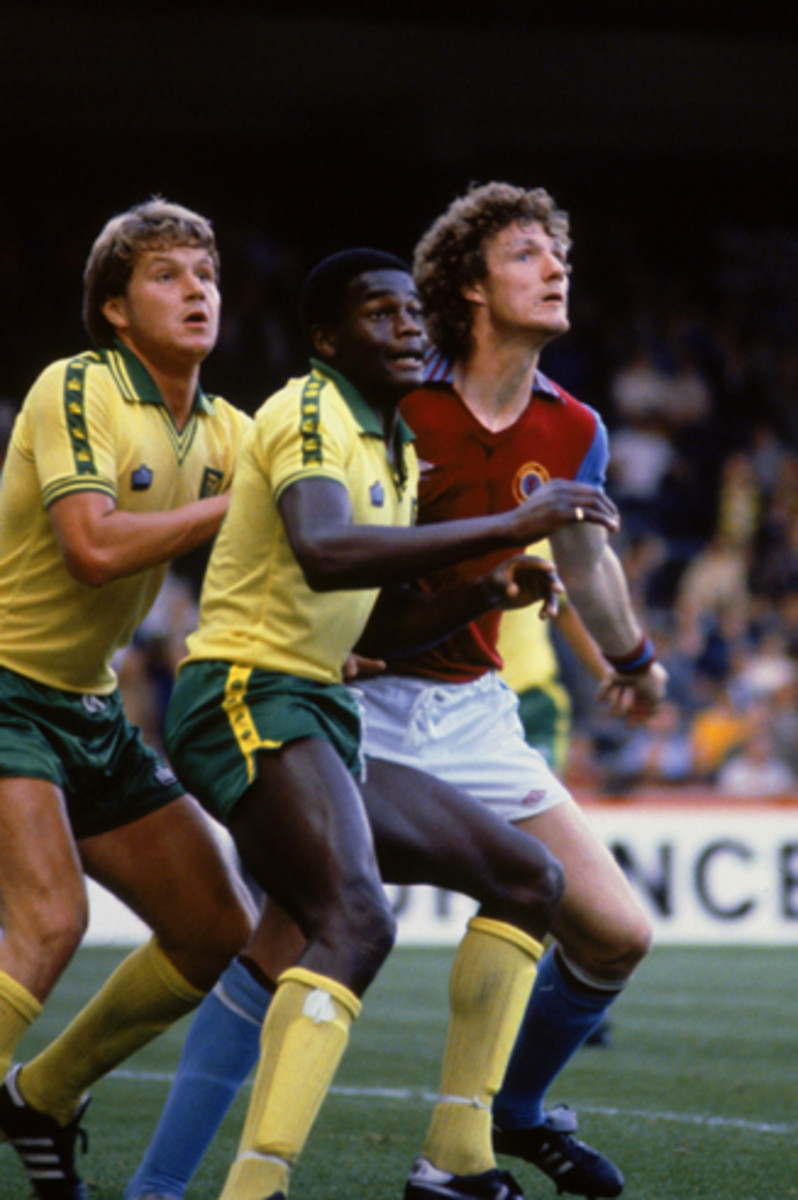 Justin Fashanu, center, proved to be a challenge for opposing defenders while at Norwich City.