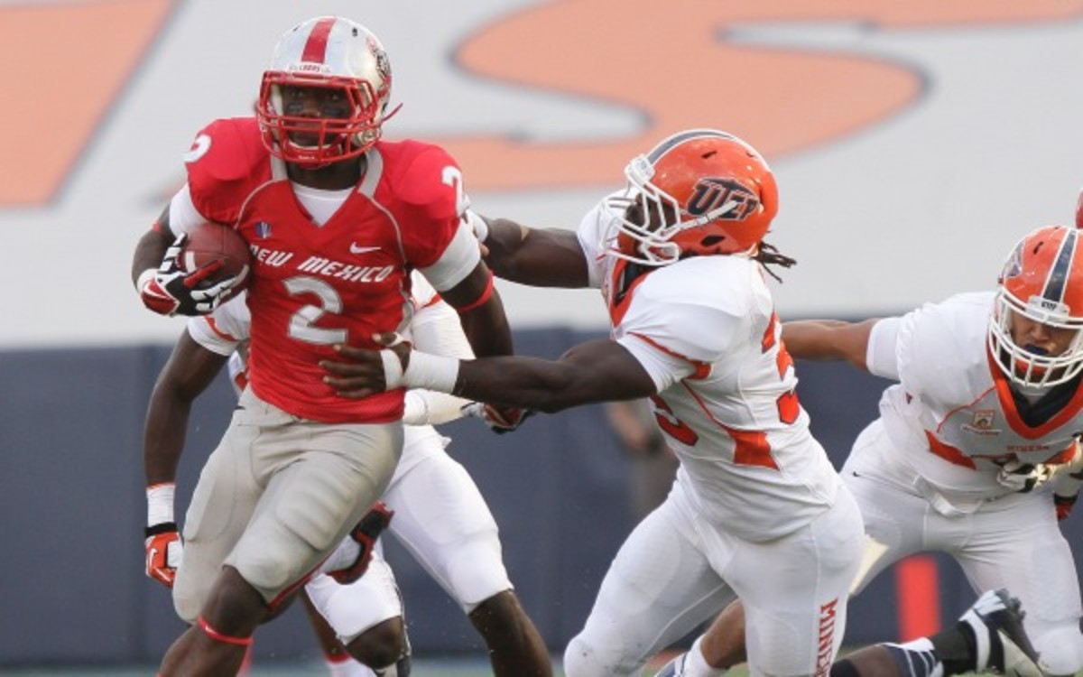 New Mexico running back Crusoe Gongbay, , outruns UTEP linebacker Horace Miller during the first half of an NCAA college football game in El Paso, Texas, Saturday, Sept. 7, 2013. (AP Photo/El Paso Times, Mark Lambie)