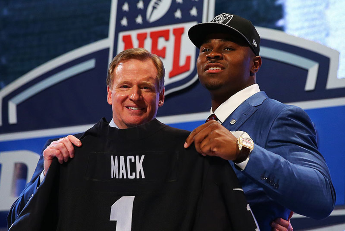 Roger Goodell met Mack onstage at Radio City Music Hall after the Raiders made the University of Buffalo star the fifth pick in the draft. (Elsa/Getty Images)