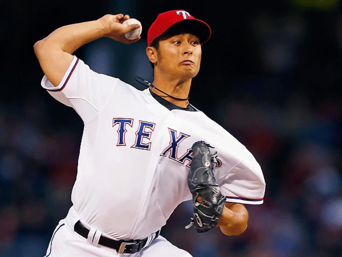 Yu Darvish was outpitched by Felix Hernandez, but only surrendered two earned runs against Seattle. (Tom Pennington/Getty Images)