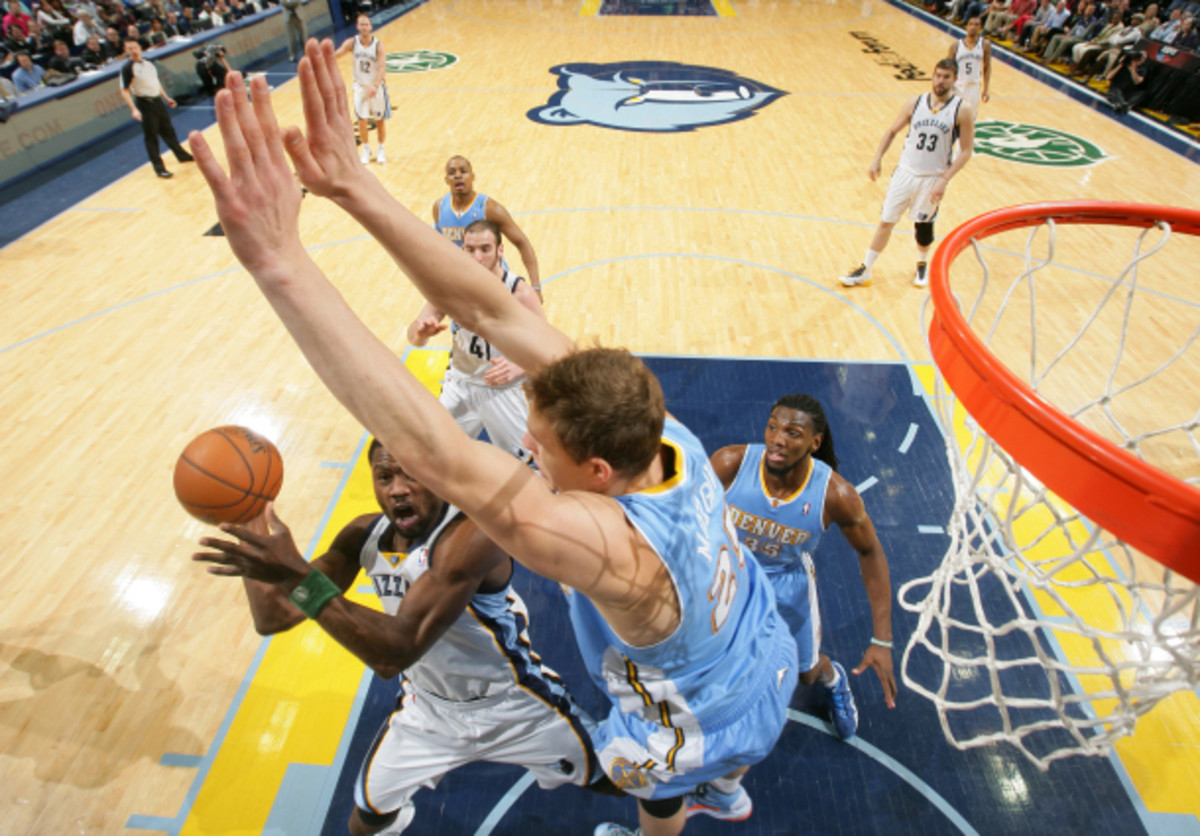 Reserve center Timofey Mozgov helped salvage Denver's worrisome defense. (Kevin C. Cox/Getty Images)
