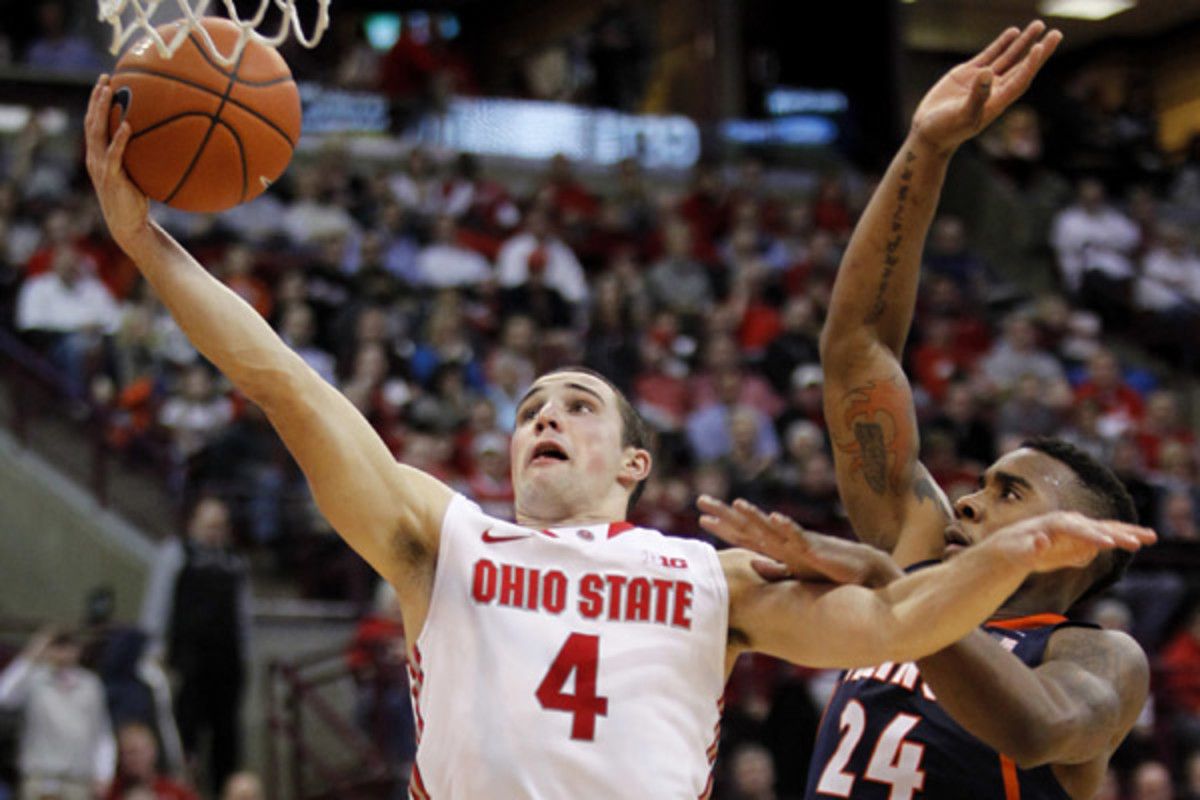 Aaron Craft chipped in 11 points while stepping up his defensive game to help Ohio State snap its losing streak at four games. (Paul Vernon/AP)