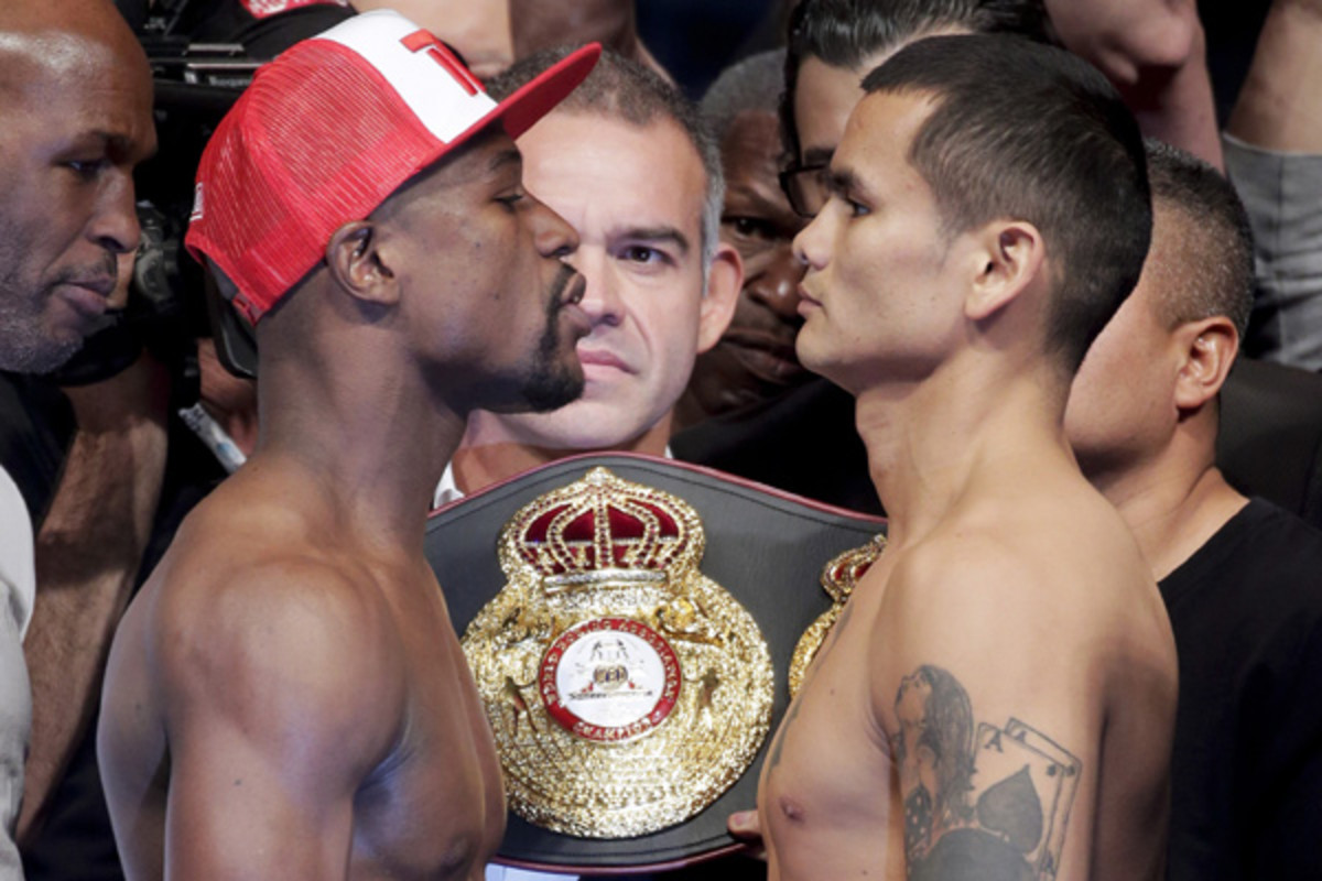 Can Marcos Maidana hold his own against reigning WBC welterweight champion Floyd Mayweather? (Chris Carlson/AP)