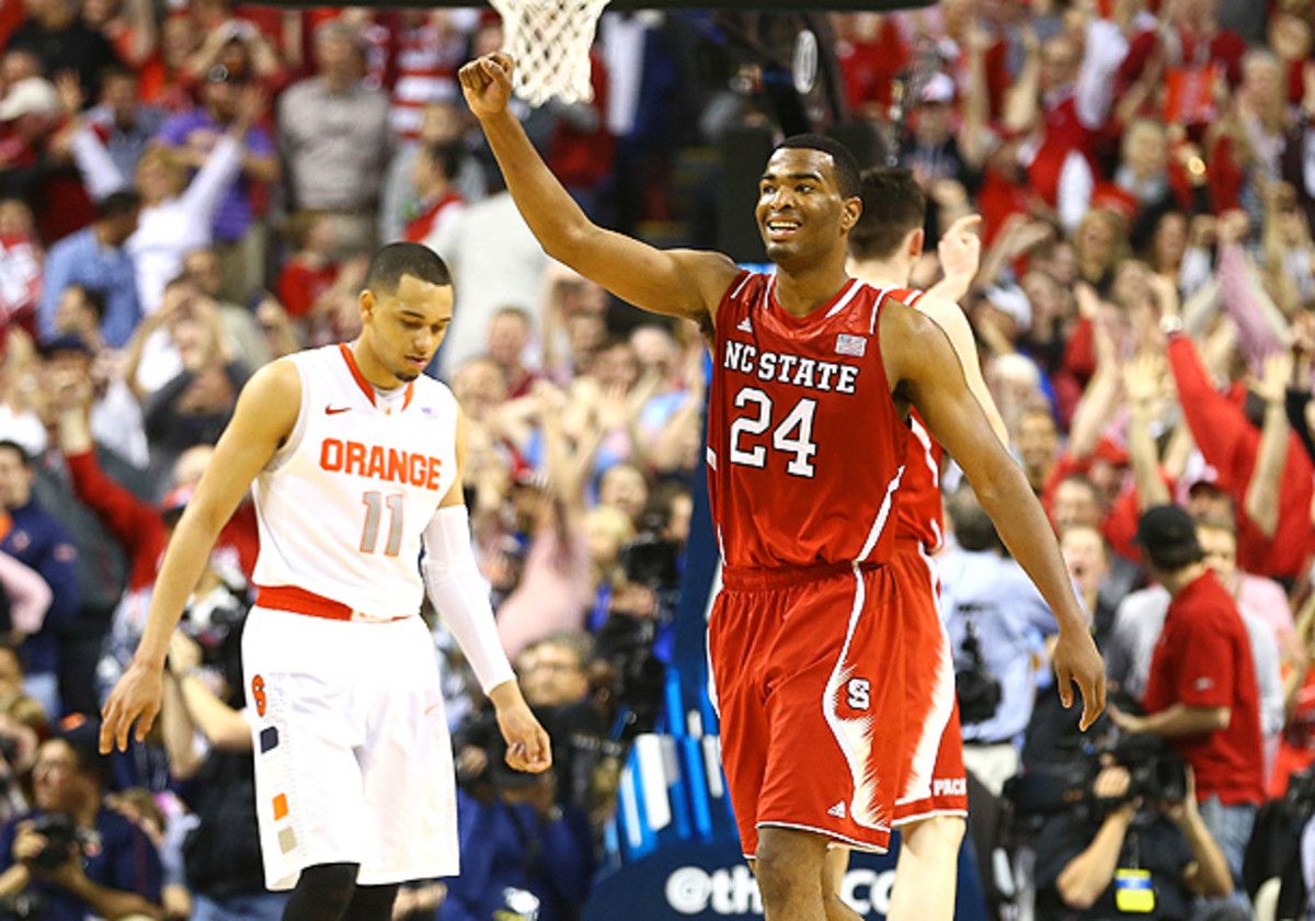 Tyler Ennis (left) and T.J. Warren went head-to-head trying to outscore the other Friday night. (Streeter Lecka/Getty Images)