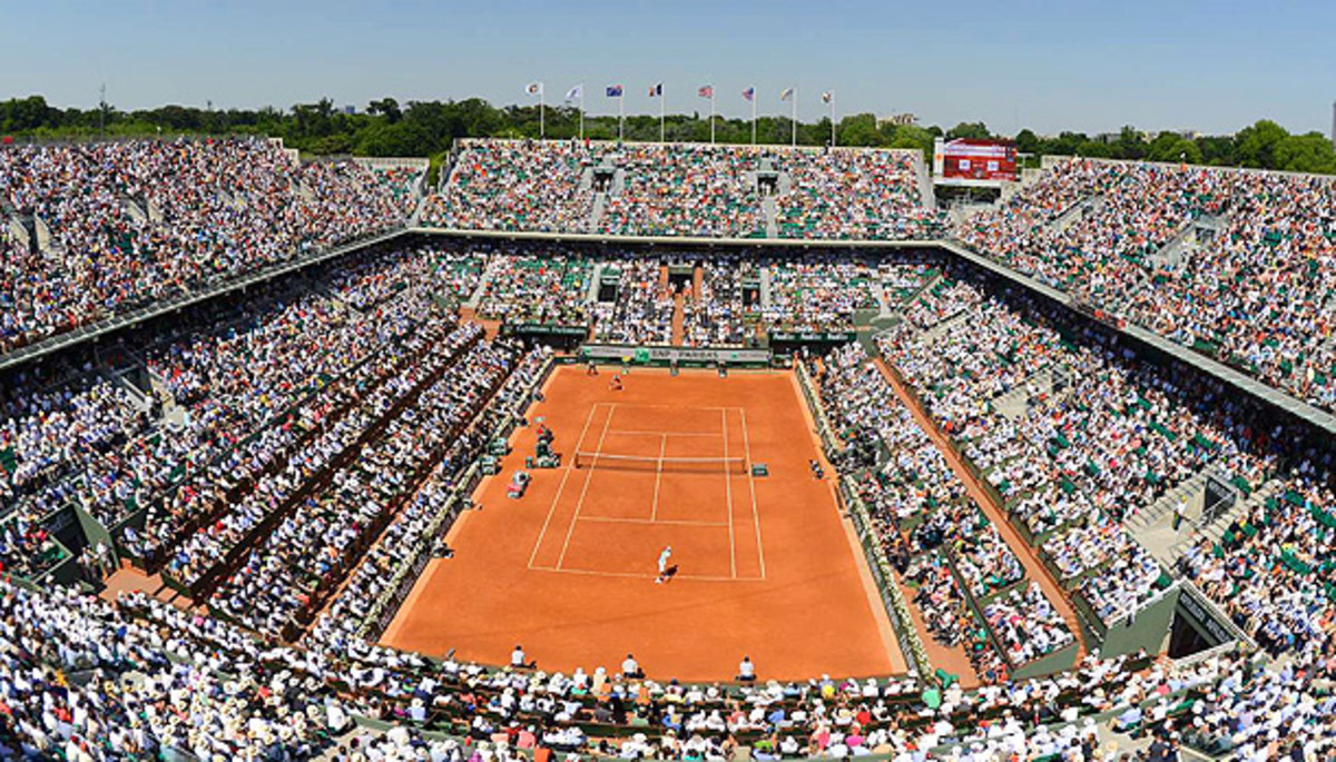 The clay courts at Roland Garros require quite a bit of maintenance throughout the French Open. (Bob Martin/SI)