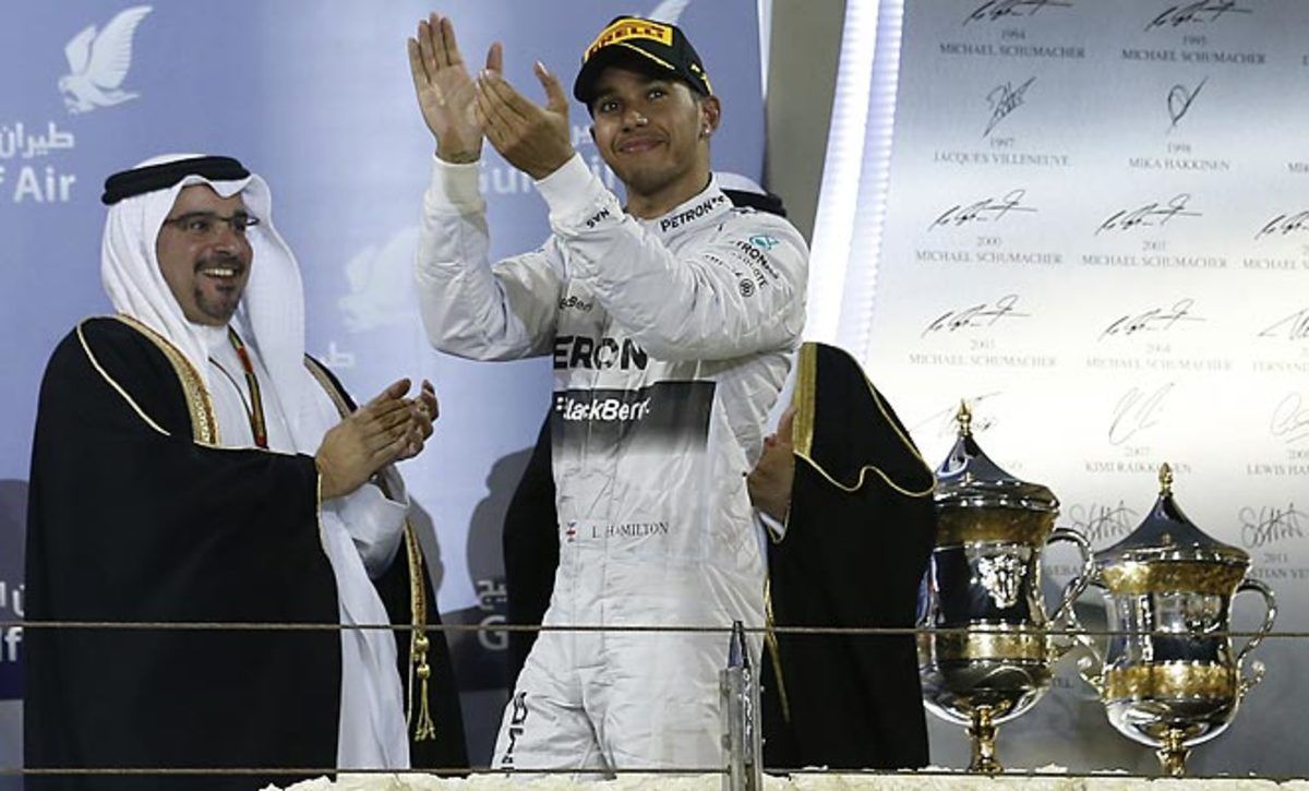 Lewis Hamilton barely edged out his Mercedes teammate to capture the Bahrain Grand Prix.
