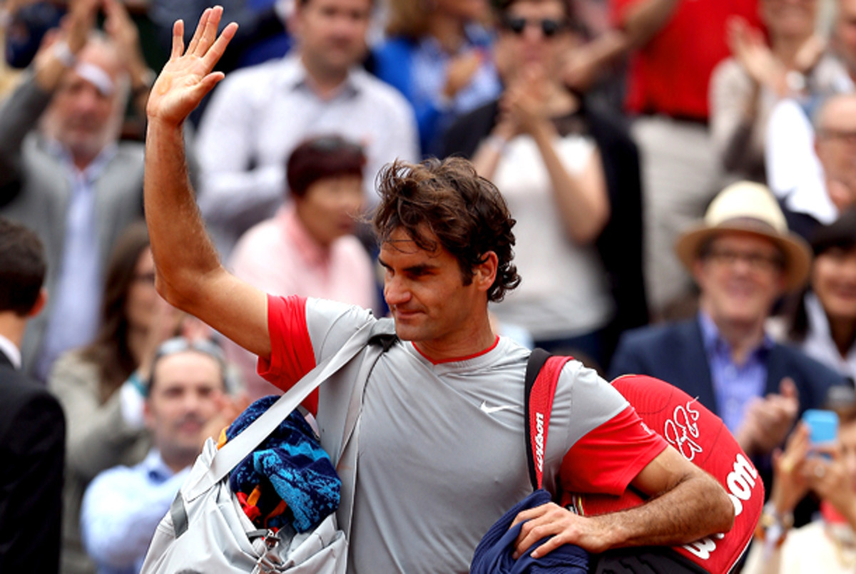 This is the first time in eight years that Roger Federer hasn't made the quarterfinals at the French Open. (Matthew Stockman/Getty Images)