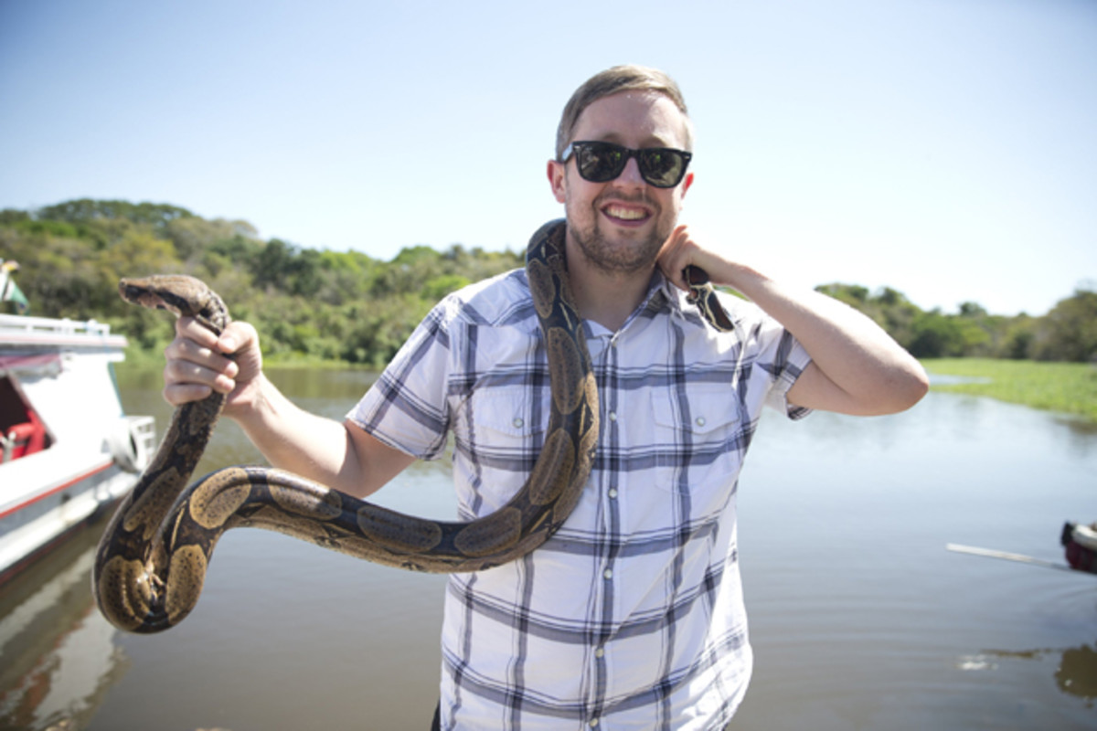 SI's Greg Bishop takes part in a tour of the Amazon jungle in Manaus, including the opportunity to hold the local snakes, sloths and baby alligators. 