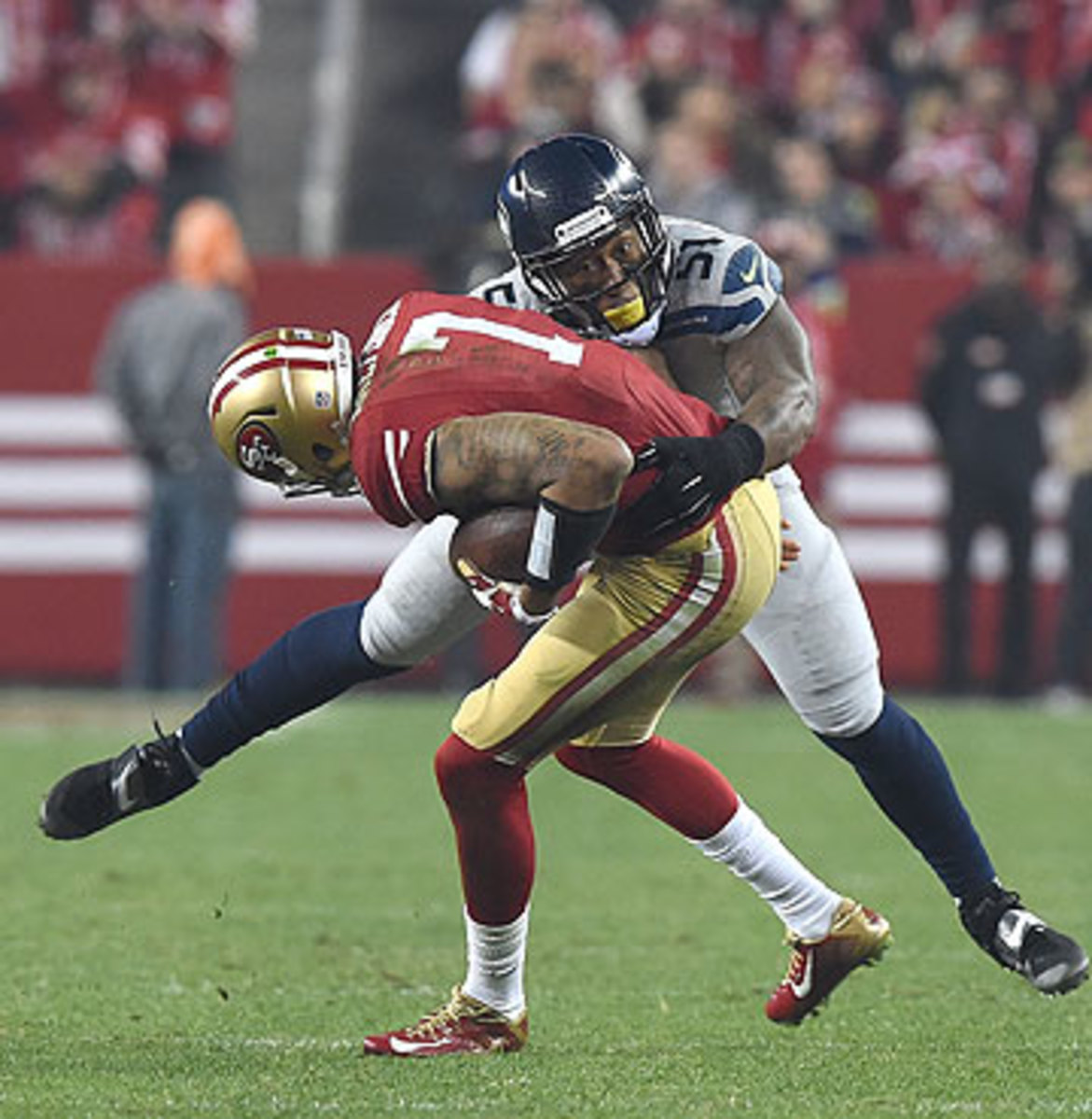 Bruce Irvin notched one of the Seahawks' four sacks of Colin Kaepernick on Thursday night. (Thearon W. Henderson/Getty Images)