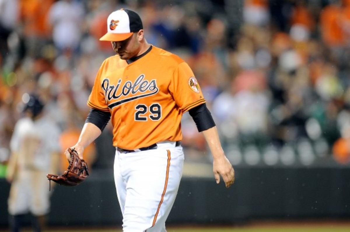 Orioles pitcher Tommy Hunter has a 6.06 ERA and 1.84 WHIP in 16 and 1/3 innings. (Greg Fiume/Getty Images)