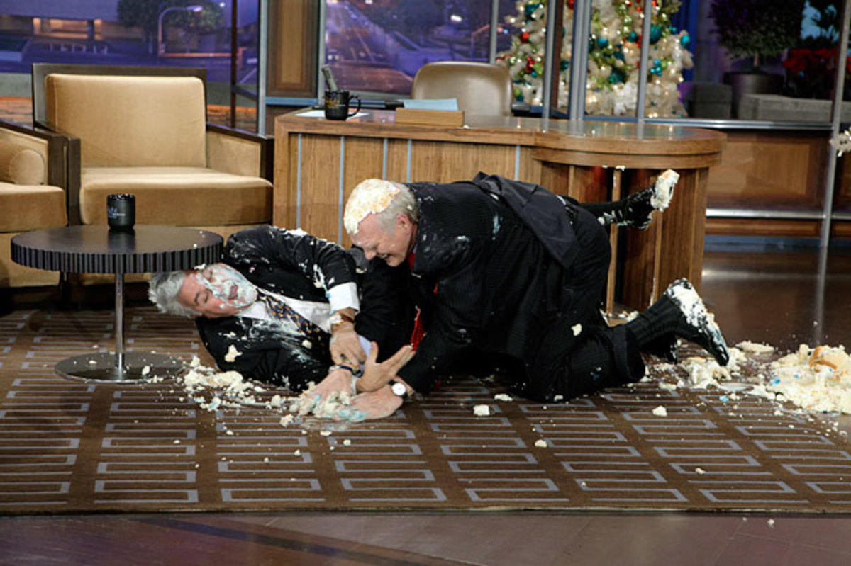 140206164218-2012-jay-leno-terry-bradshaw-cake-fight-single-image-cut.jpg