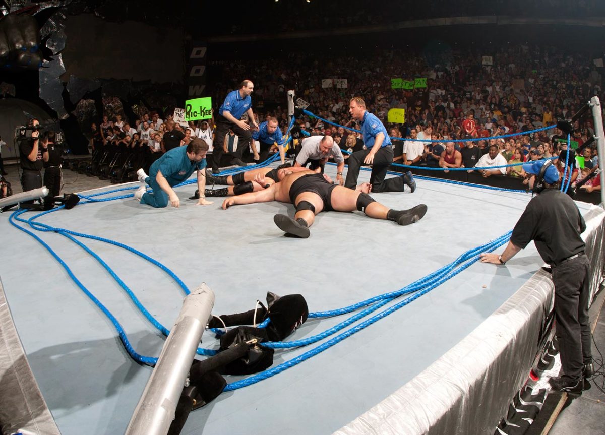 2003-0610-Big-Show-Brock-Lesnar-collapsed-ring.jpg