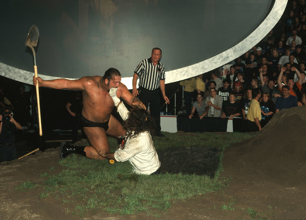 1999-0909-Rock-'n'-Sock-Connection-Unholy-Alliance-Big-Show-Mankind-Buried-Alive.jpg