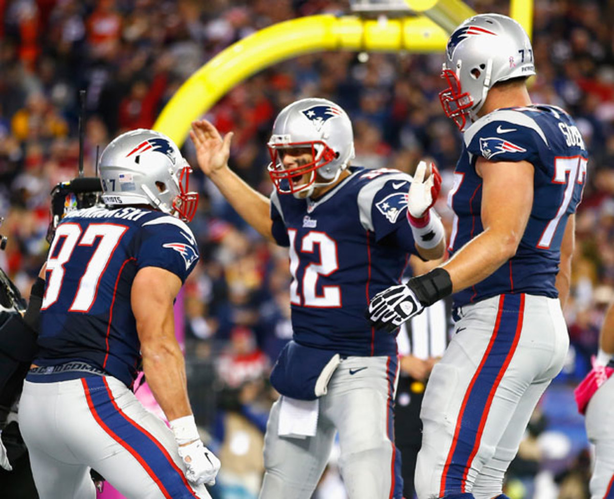 Rob Gronkowski, Tom Brady and Nate Solder :: Getty Images