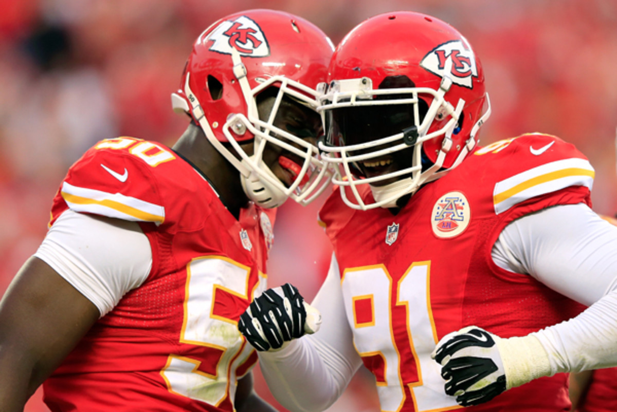 Justin Houston (l.) and Tamba Hali combined for 22 sacks in 2013. (Jamie Squire/Getty Images)