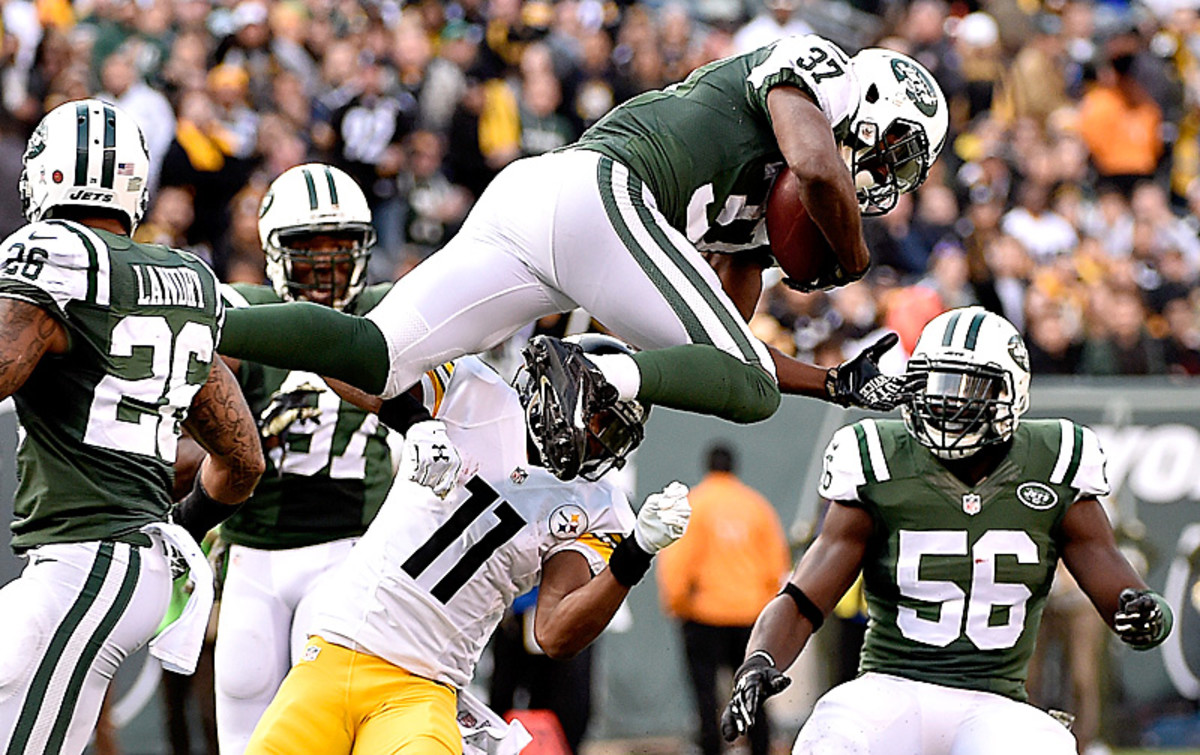 Jaiquawn Jarrett and the Jets defense forced four turnovers Sunday, one more than they'd forced all season. (Al Bello/Getty Images)