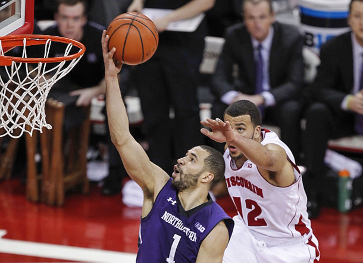 Northwestern found ways to get easy buckets against Wisconsin, while the Badgers struggled to score. (Andy Manis/AP)