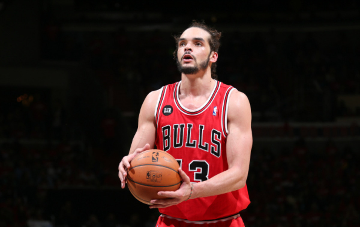Joakim Noah was awarded the Defensive Player of the Year for the 2013-'14 season. (Ned Dishman/National Basketball/Getty Images)