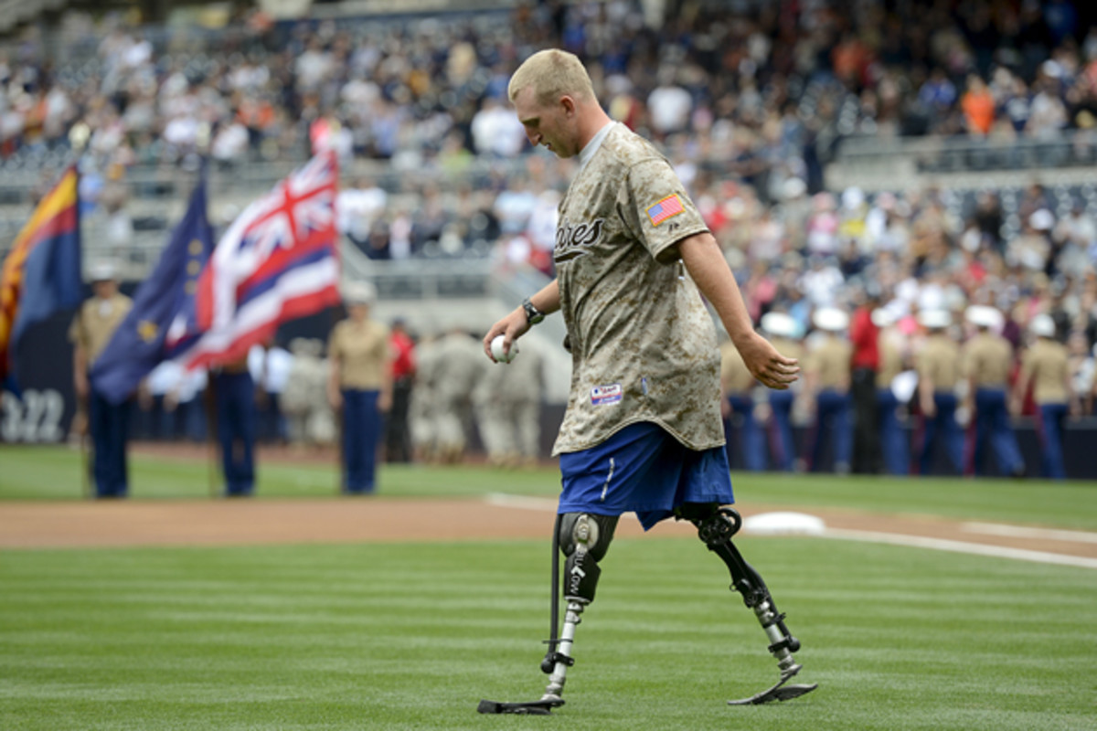 Jones walks to throw out the first pitch at the Detroit Tigers-San Diego Padres game in April.