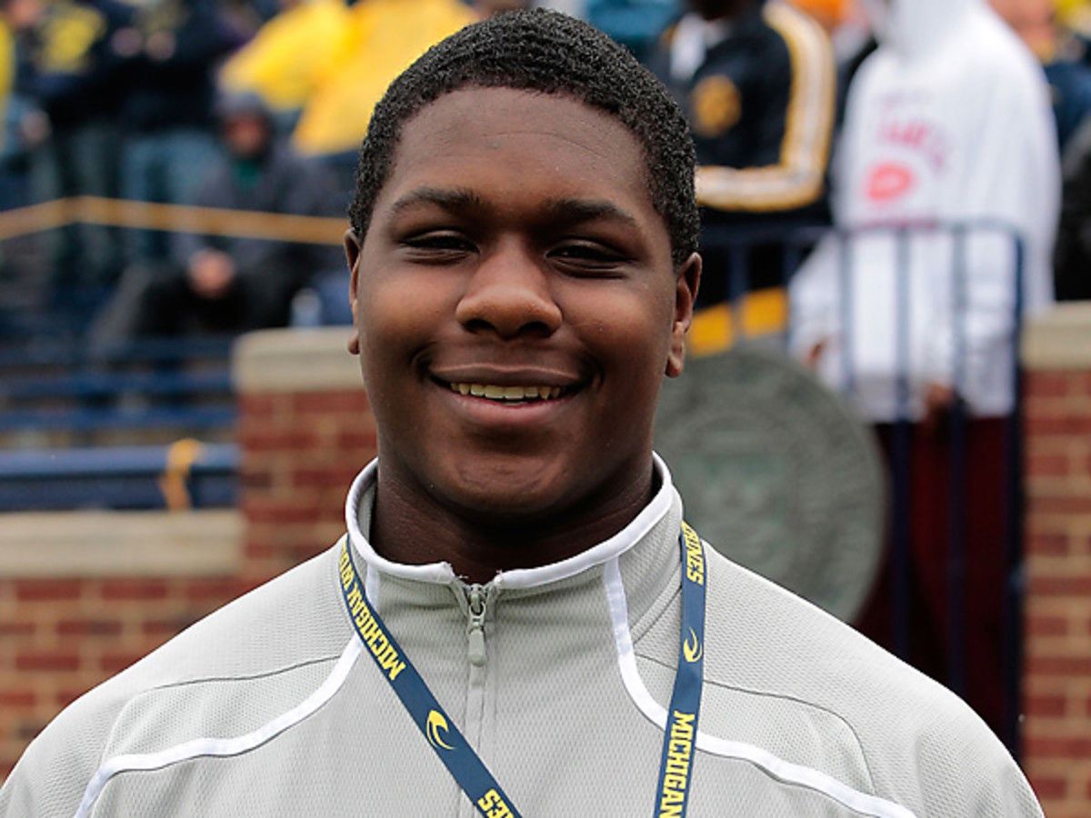 Five-star DE Malik McDowell, seen hereat Michigan, will be headed to rival Michigan State. (Leon Halip/Getty Images)