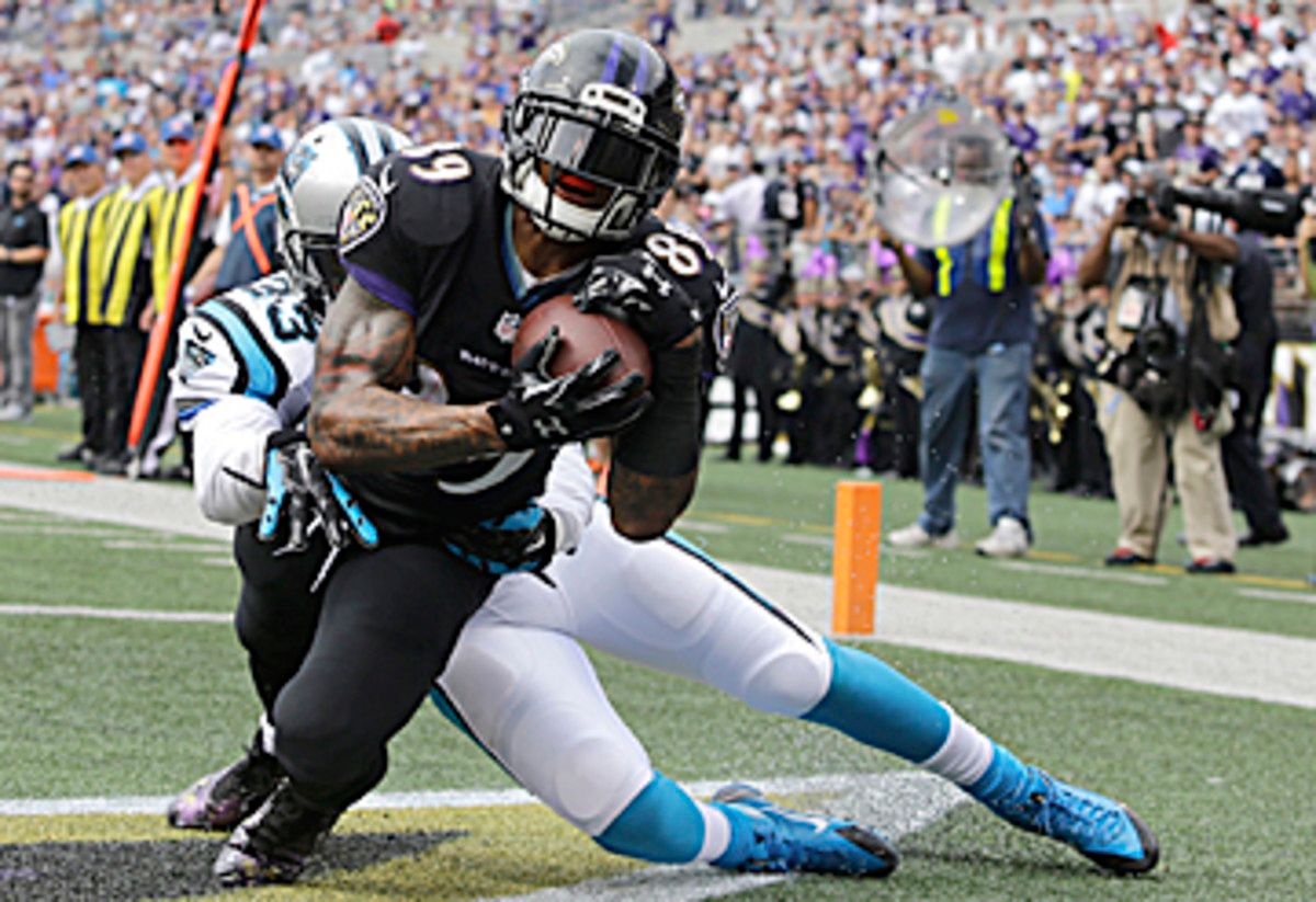 Smith hauled in his second TD pass despite defensive pass interference. (Patrick Semansky/AP)